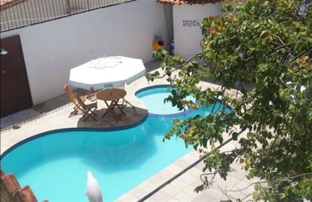 Outdoor pool, pool umbrellas, sun loungers