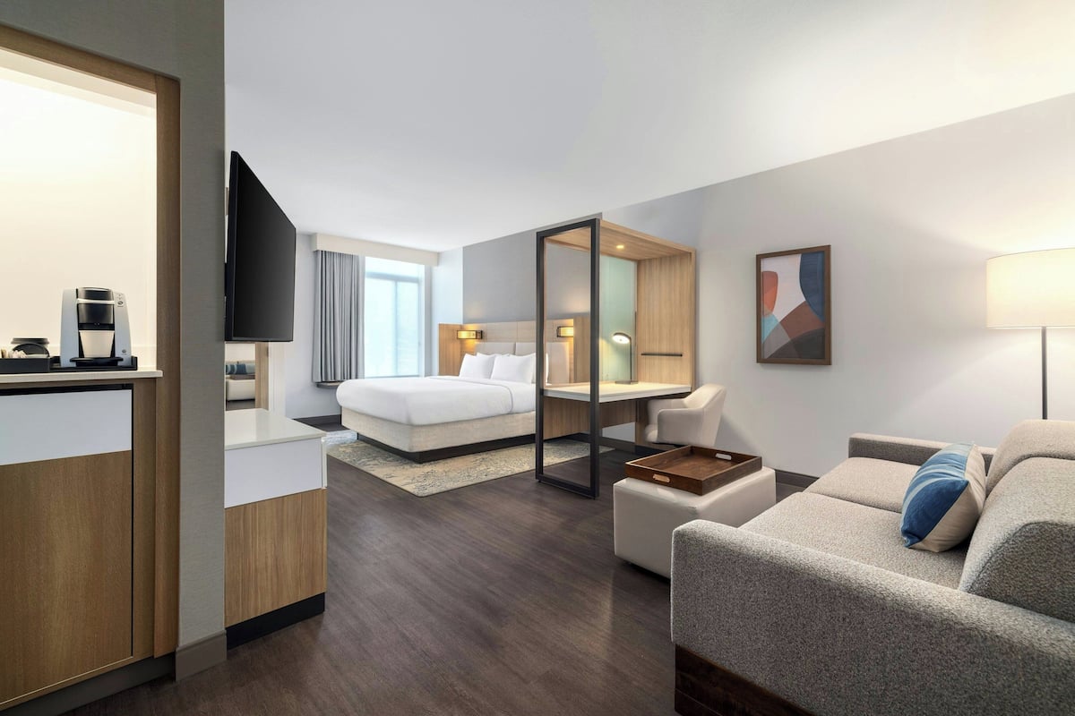 Suite, Multiple Beds | Pillow-top beds, in-room safe, desk, iron/ironing board
