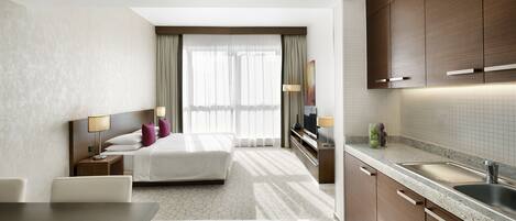 Premium bedding, pillow-top beds, minibar, in-room safe