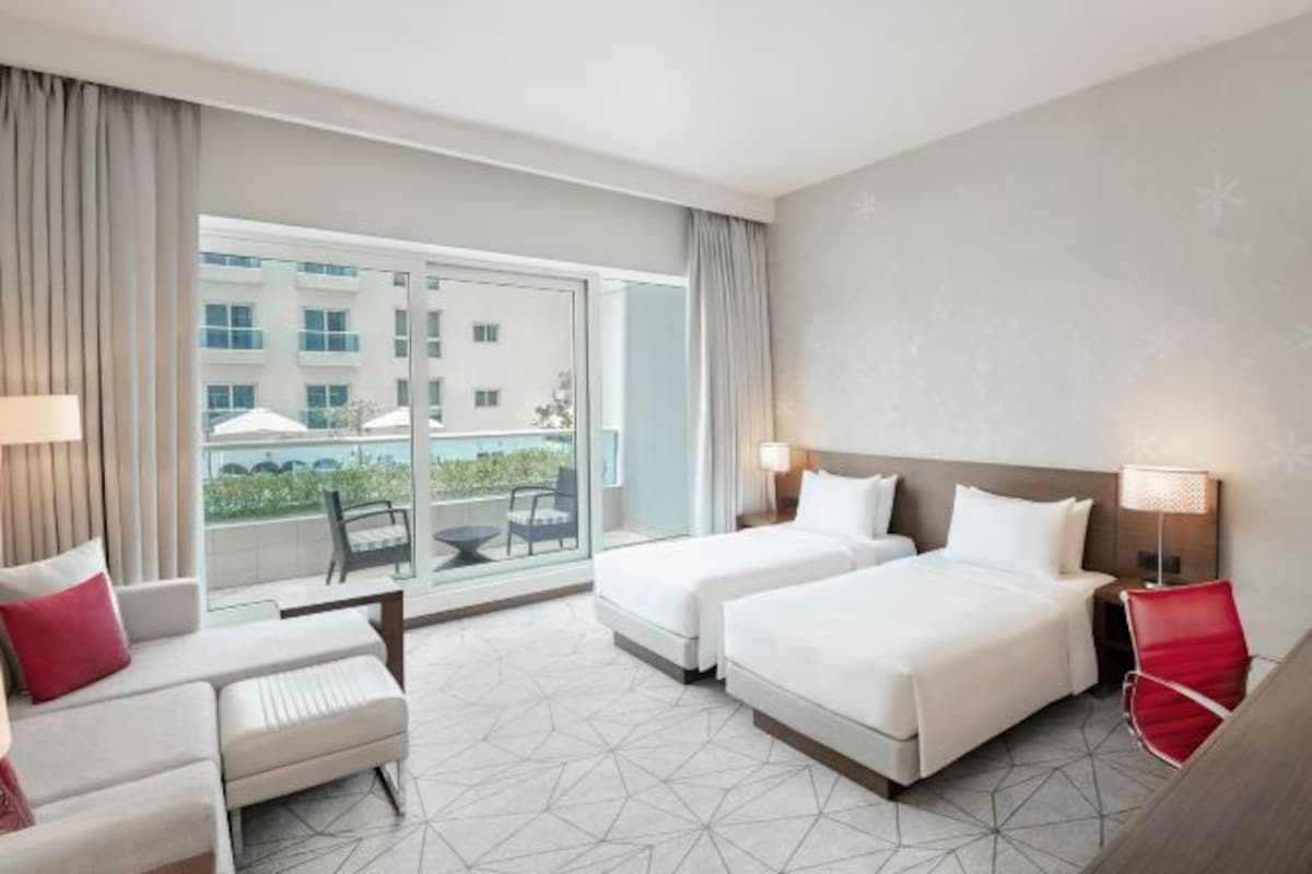 Premium bedding, pillowtop beds, minibar, in-room safe