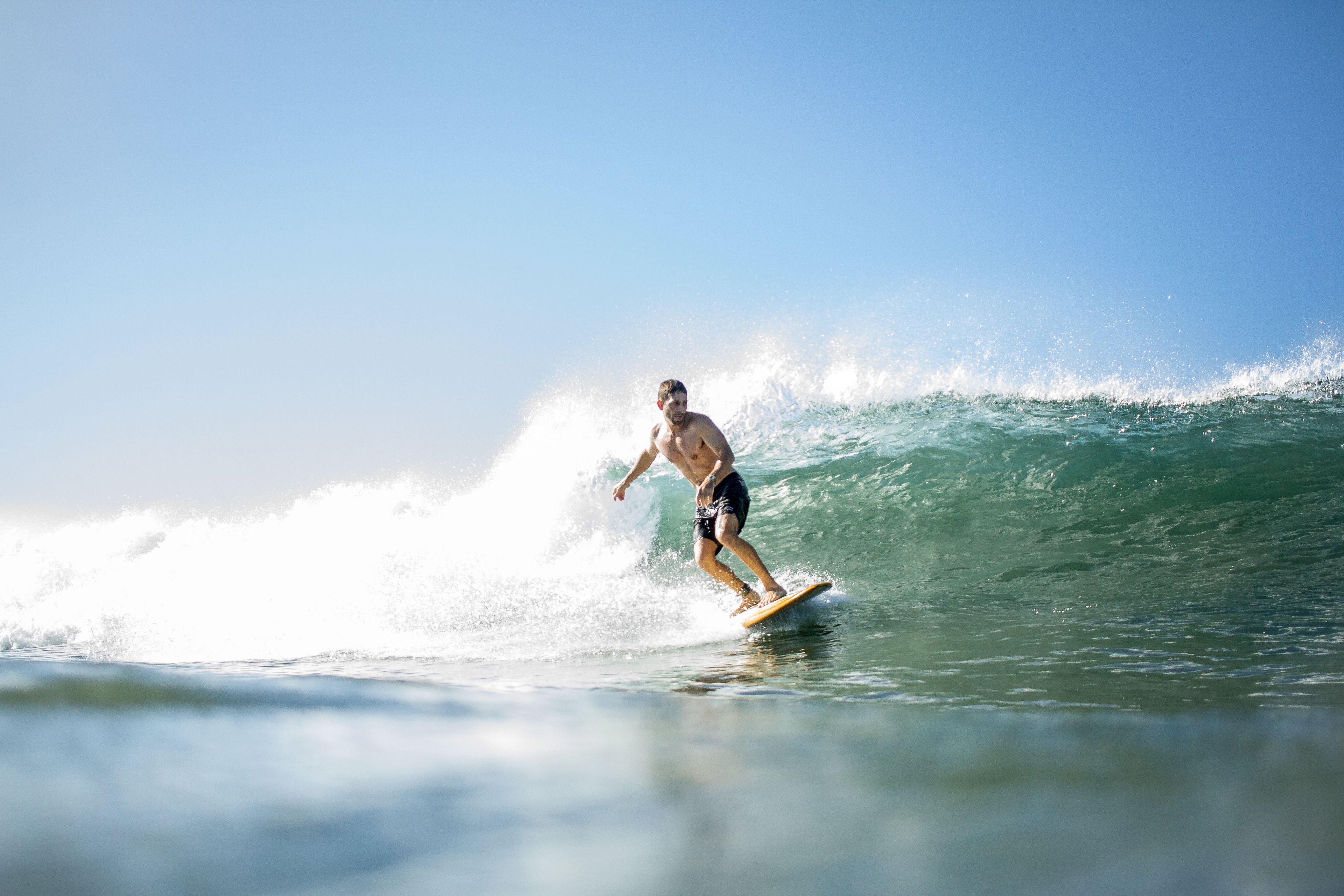 A person surfing on a wave.