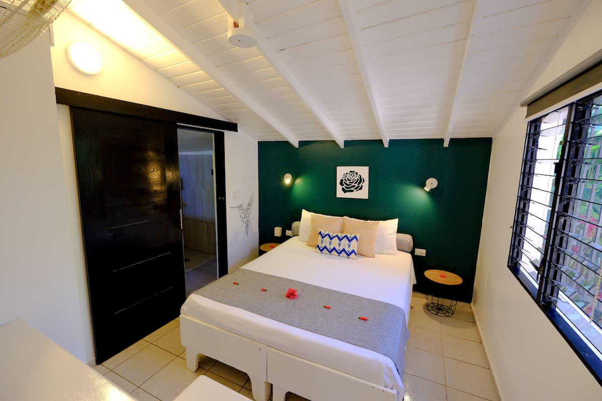 Bungalow, 2 Bedrooms, Kitchenette, Pool View | 1 bedroom, in-room safe, desk, free WiFi