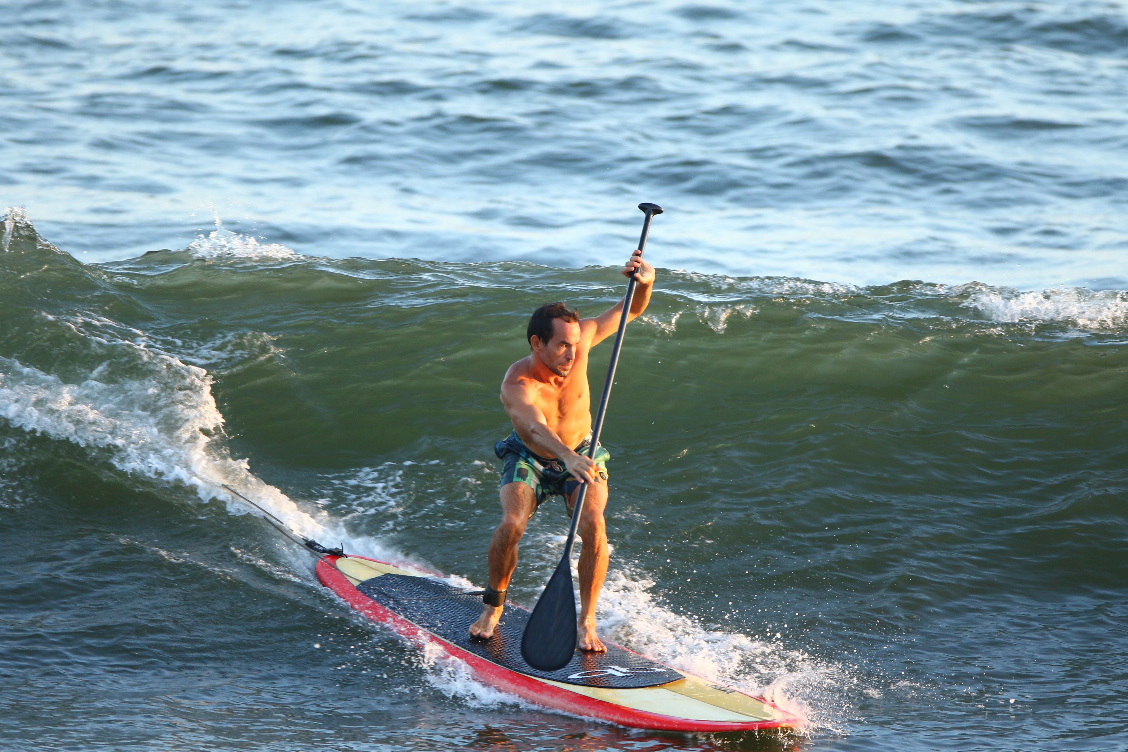 on the beach, black sand, kayaking