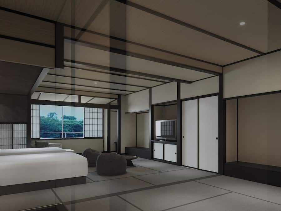 A modern bedroom with a large bed, a TV, and sliding doors.