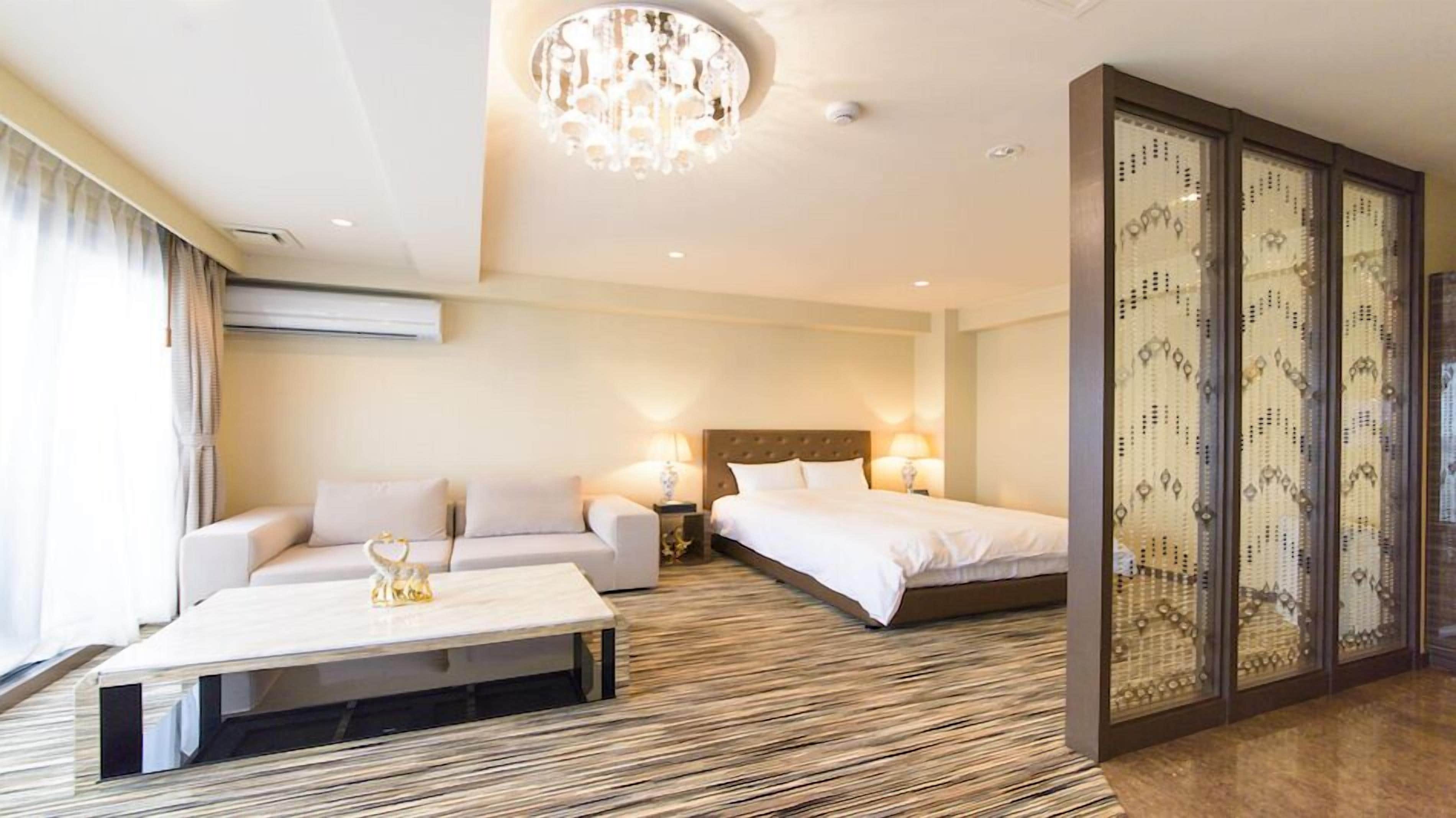 Premium bedding, down duvets, blackout curtains, iron/ironing board