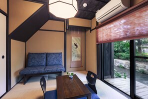 Japanese Style Townhouse | Living area | Flat-screen TV