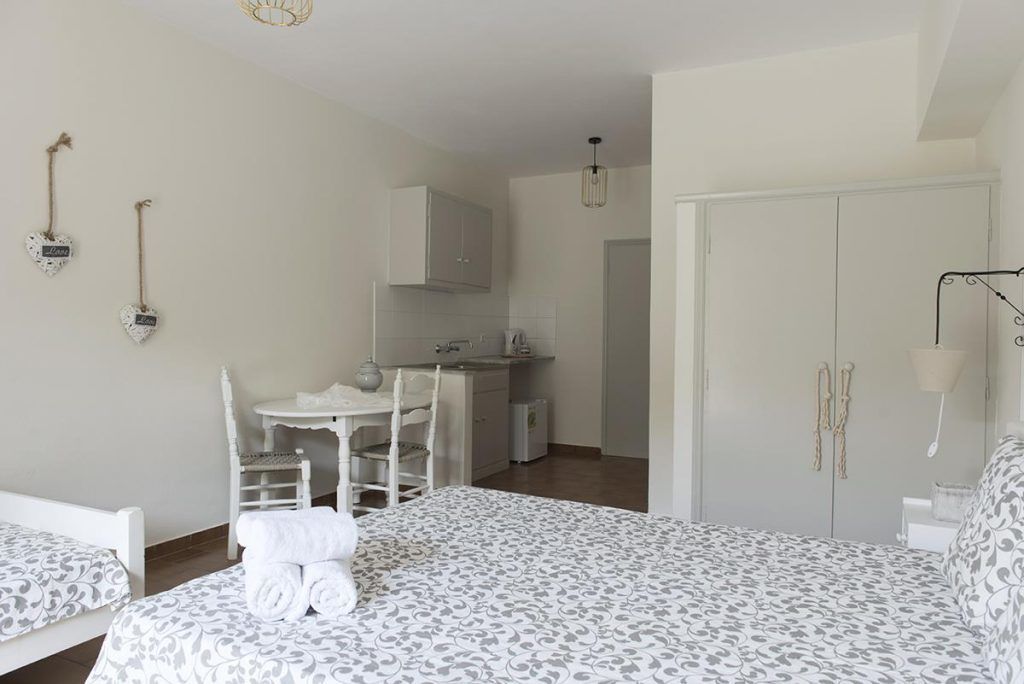 triple room, garden view | minibar, soundproofing, iron/ironing board, free wifi