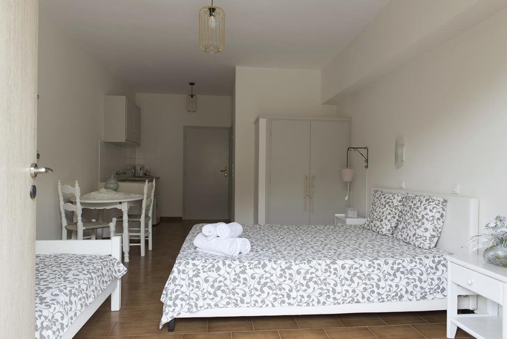 triple room, garden view | minibar, soundproofing, iron/ironing board, free wifi