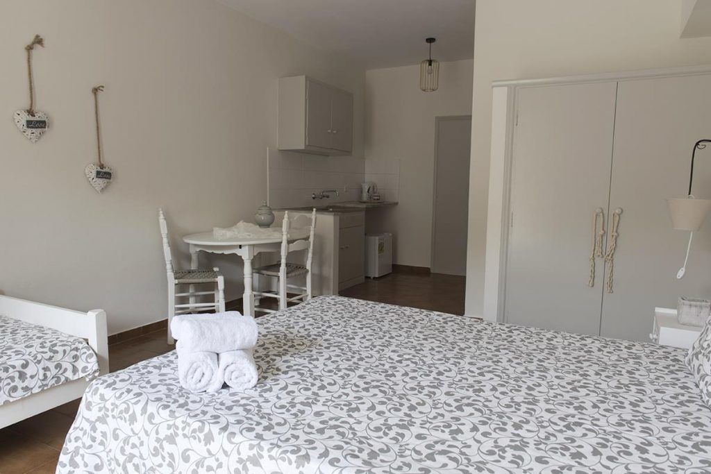 triple room, garden view | minibar, soundproofing, iron/ironing board, free wifi