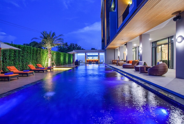 Outdoor pool, open 7:00 AM to 10:00 PM, pool umbrellas, sun loungers