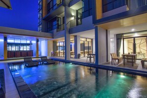 Outdoor pool, open 7:00 AM to 10:00 PM, pool umbrellas, sun loungers