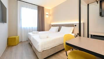 Hypo-allergenic bedding, in-room safe, desk, laptop workspace