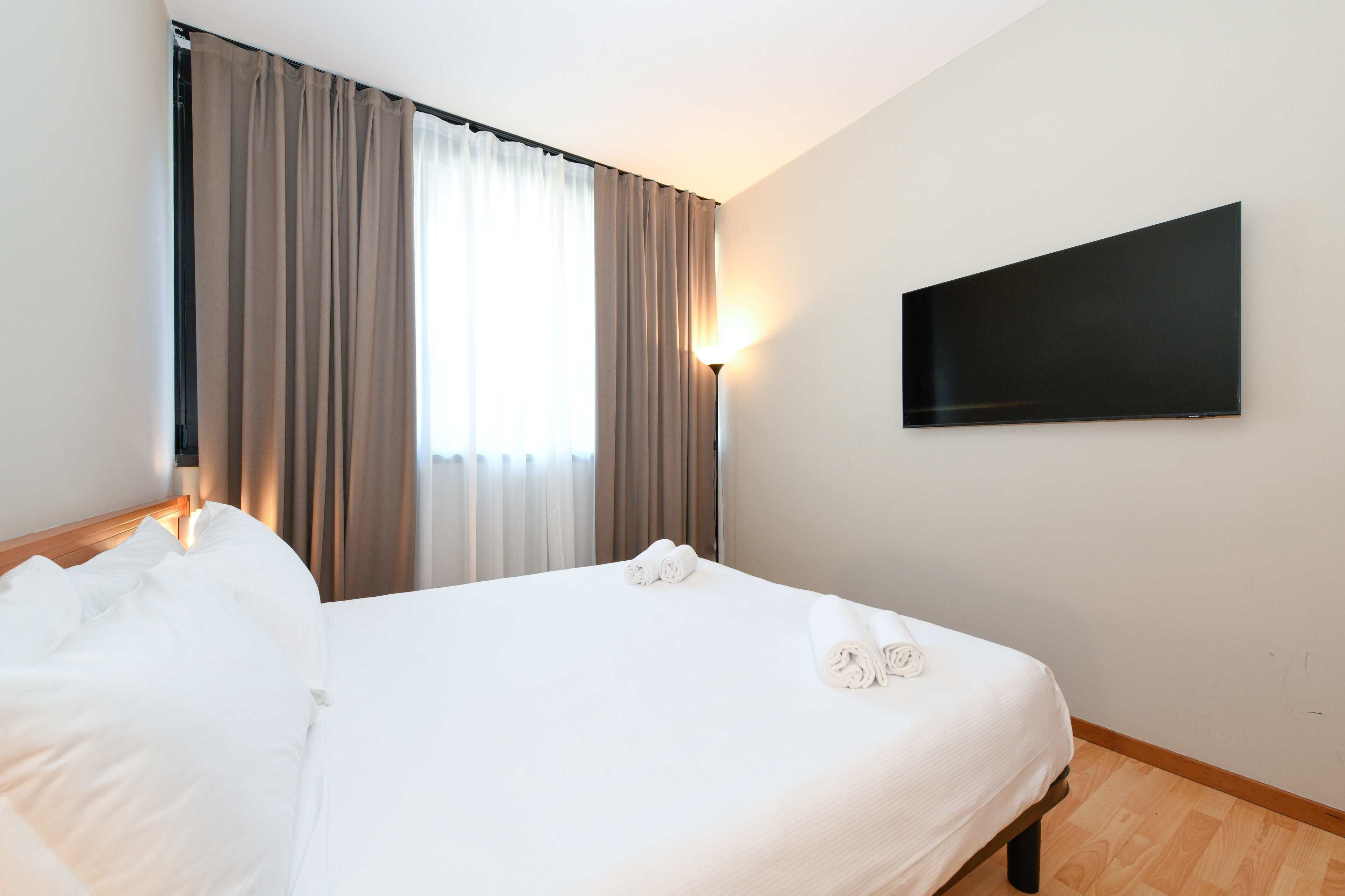 Habitación doble estándar | Ropa de cama hipoalergénica y caja de seguridad en la habitación 