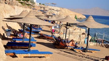 Private beach, sun loungers, beach umbrellas, beach towels