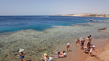 Private beach, sun loungers, beach umbrellas, beach towels