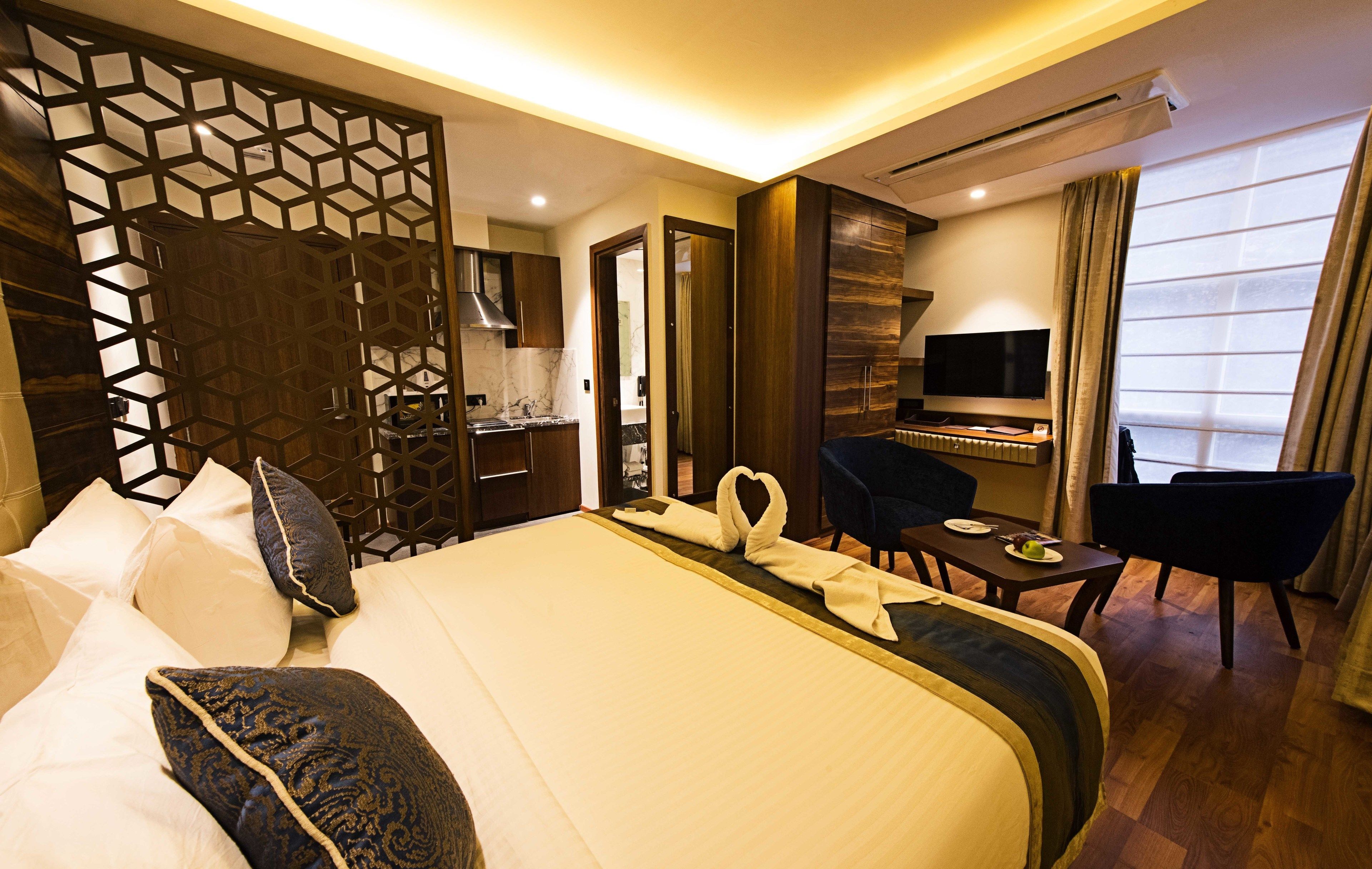 Apartamento | Minibar, escritorio, cortinas opacas y sistema de insonorización