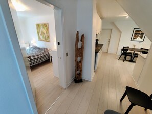Apartament Deluxe, 1 dormitori, vistes al jardí | 1 dormitori, roba de llit d'alta qualitat i caixa forta a l'habitació