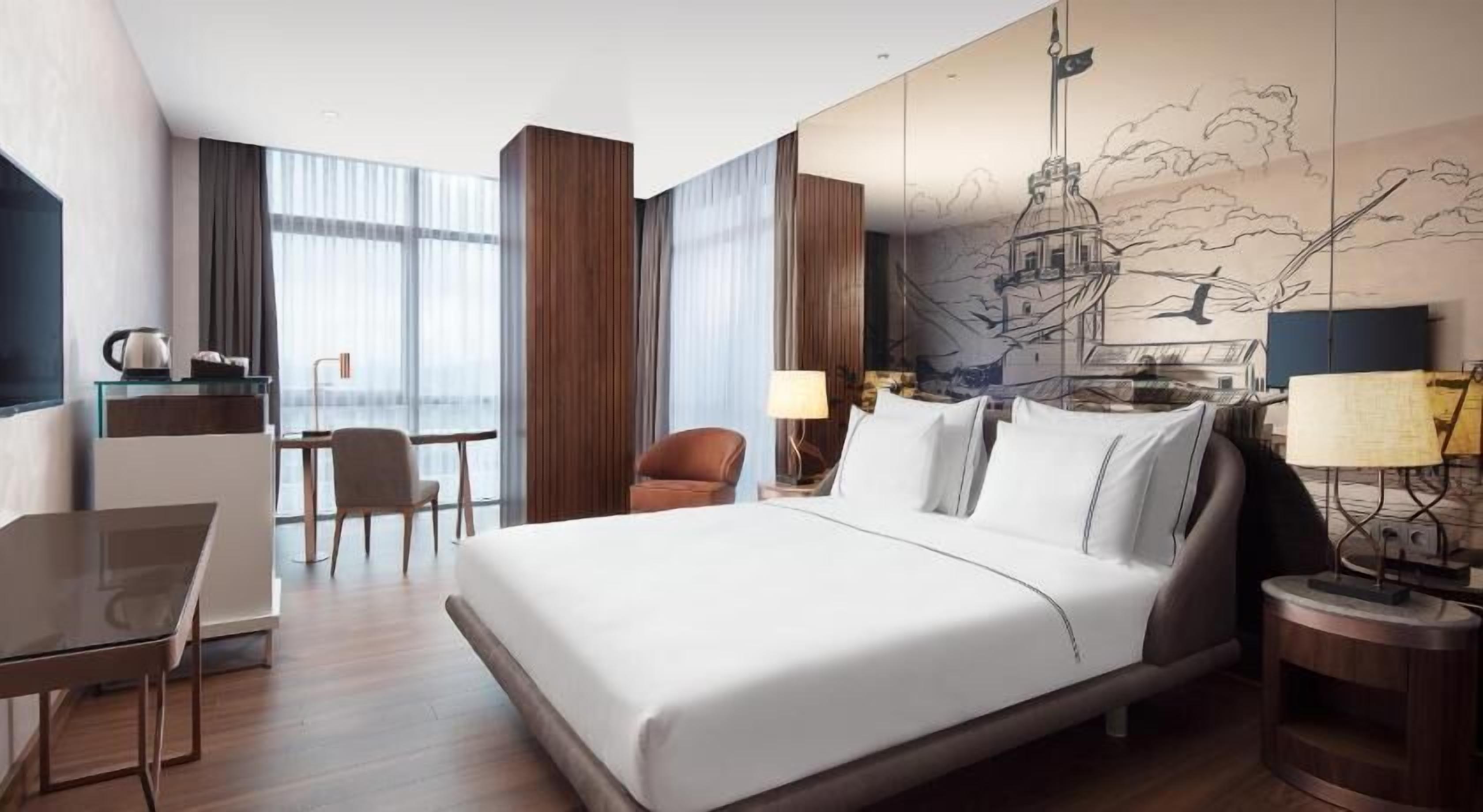 Sengetøy av topp kvalitet, minibar, safe på rommet og skrivebord