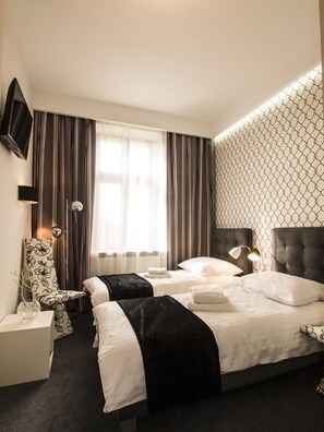 Doppel- oder Zweibettzimmer