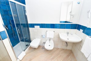 Triple Room, Balcony | Bathroom | Shower, free toiletries, hair dryer