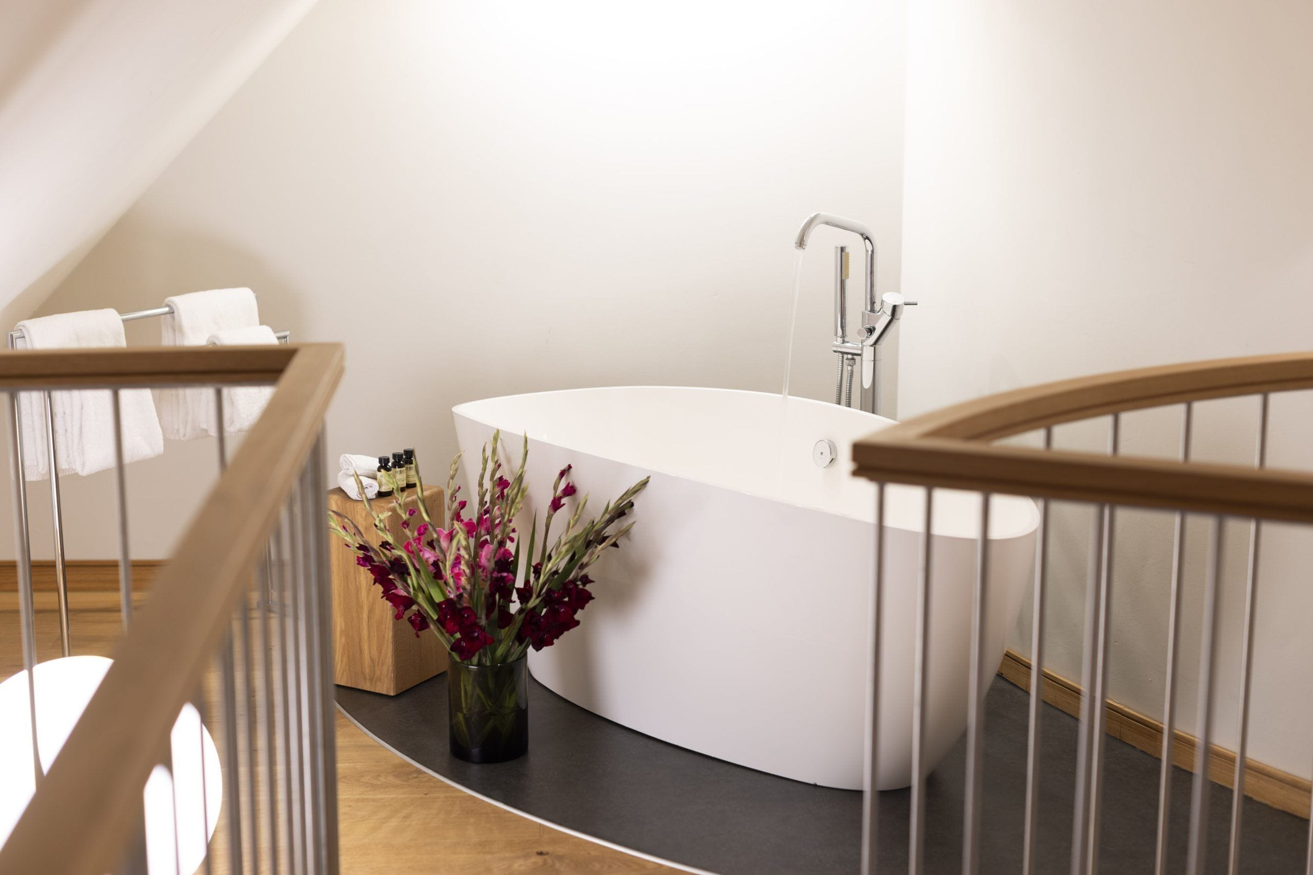 duplex | bathroom | deep-soaking bathtub, rainfall showerhead, designer toiletries