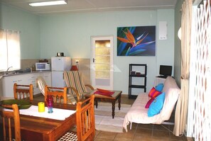 Comfort Cottage, 1 Bedroom (Drafstap Cottage) | Living area | TV, DVD player - Drafstap Cottage (Cape Town)