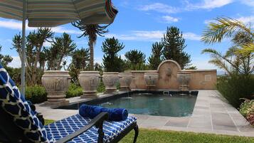 Outdoor pool, pool umbrellas, sun loungers