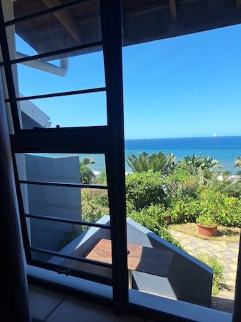 Economy Double Room, 1 Bedroom | Beach/ocean view. Dolphin Point