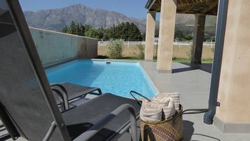 Outdoor pool, sun loungers