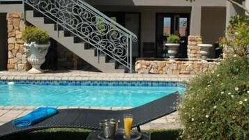 Outdoor pool, sun loungers
