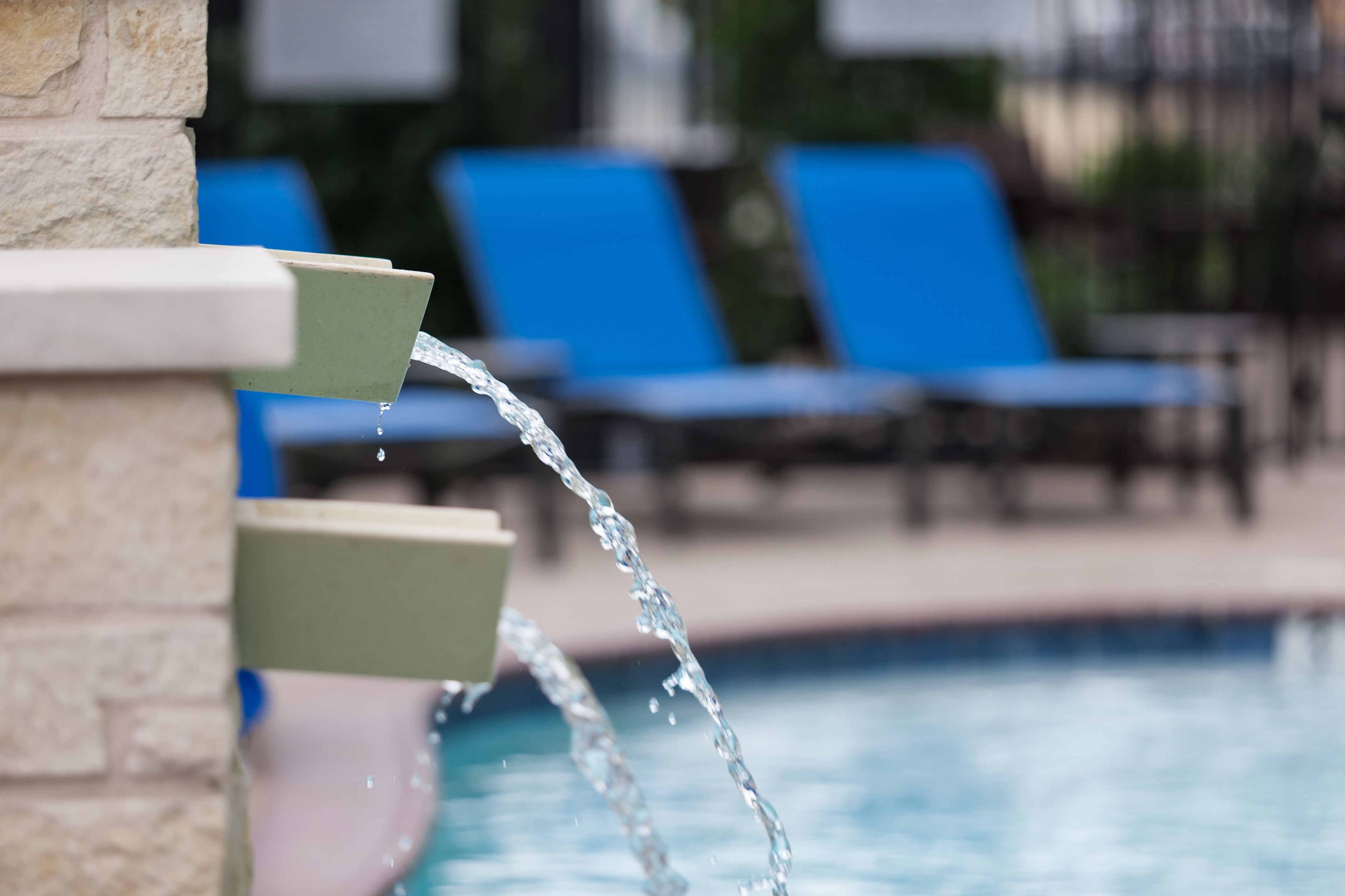 outdoor pool, open 8:00 am to 10:00 pm, pool umbrellas, pool loungers