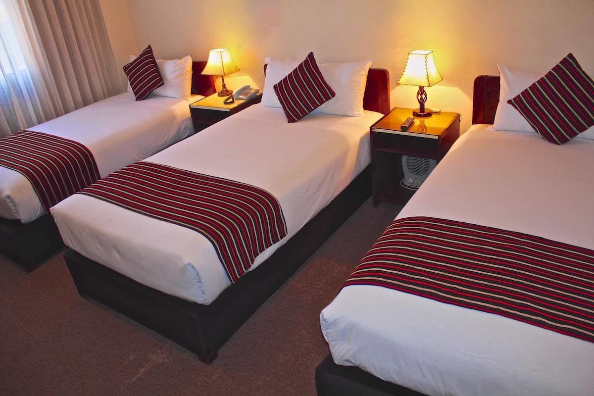 basic triple room | in-room safe, desk, free wifi, bed sheets