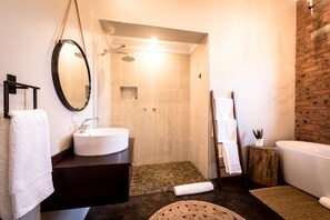 Superior Room | Bathroom | Hair dryer, towels