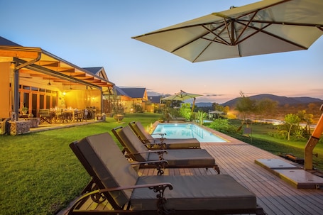 3 outdoor pools, pool umbrellas, pool loungers