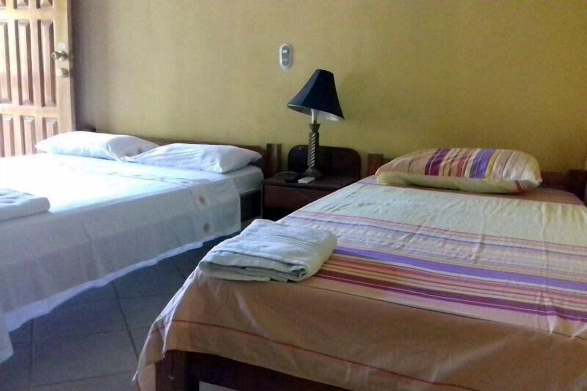 Deluxe Double Room, Garden View | Cots/infant beds, free WiFi