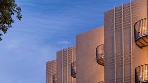 A building with multiple balconies and a clear sky. - Jacob NEA  (Mateh Asher)