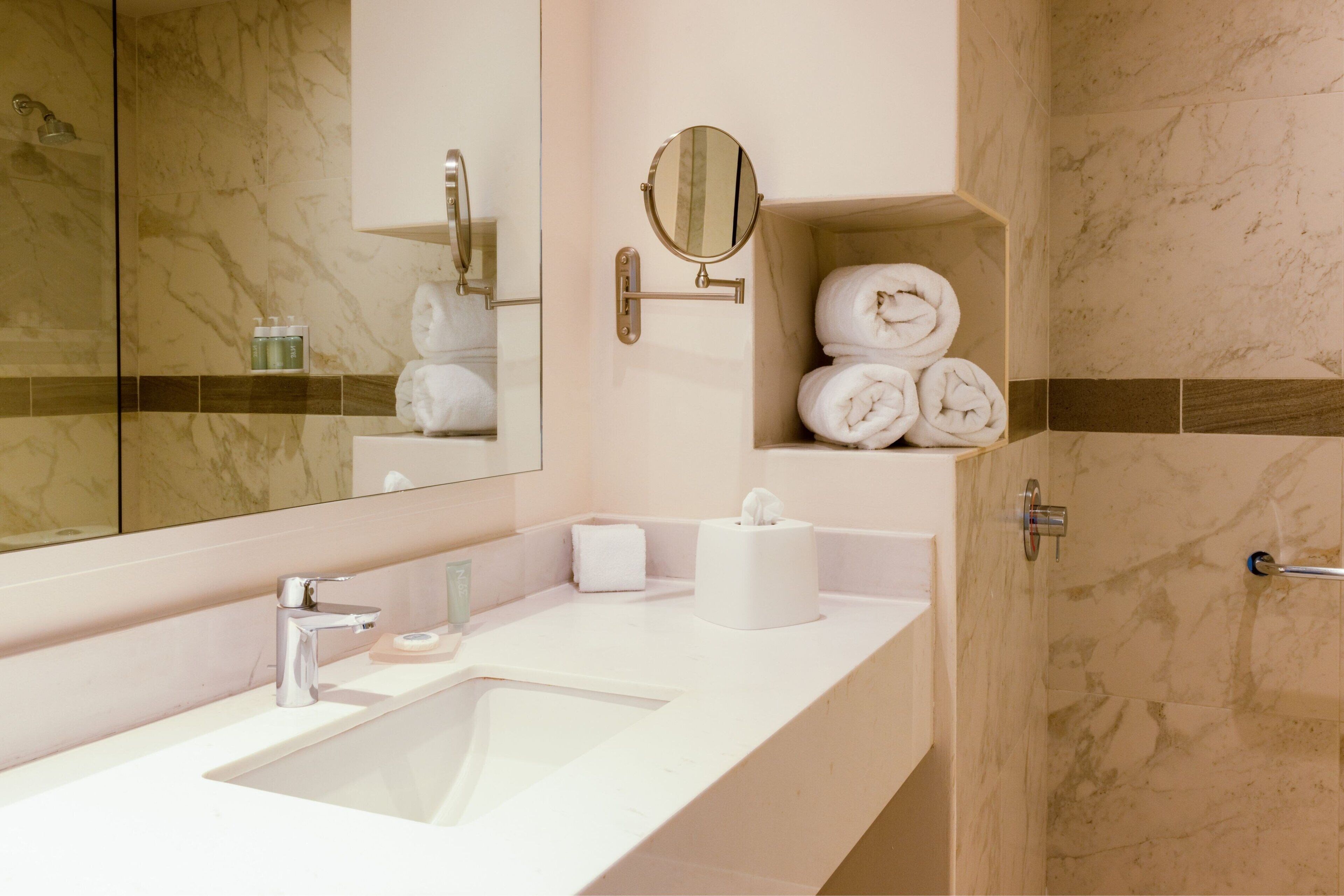 shower, free toiletries, hair dryer, towels