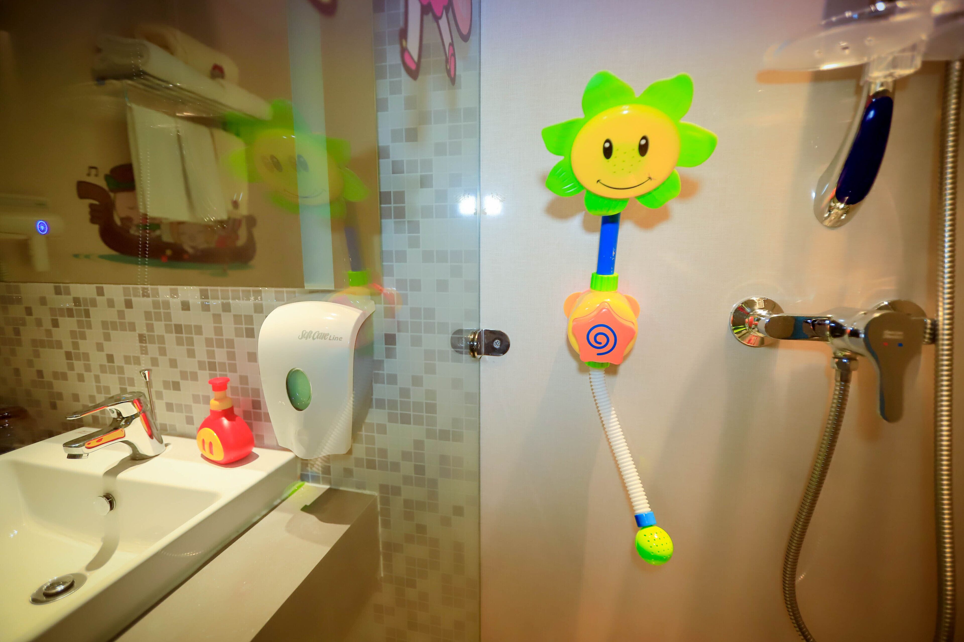 combined shower/bathtub, eco-friendly toiletries, hair dryer, bathrobes