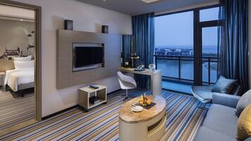 Deluxe Suite, 1 King Bed | Premium bedding, in-room safe, desk, cribs/infant beds