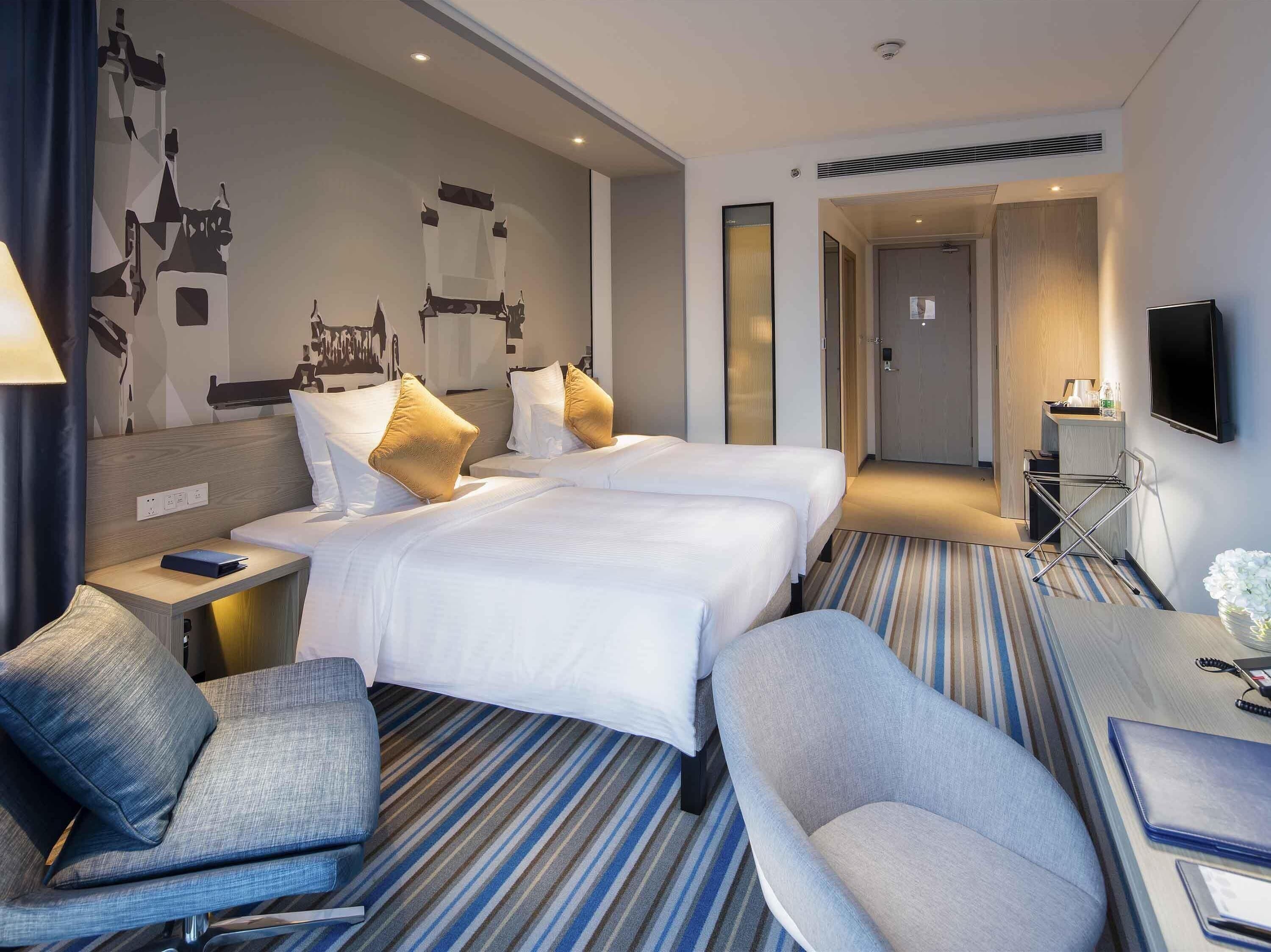 Executive-Zimmer, 2 Einzelbetten | Hochwertige Bettwaren, Zimmersafe, Schreibtisch, Babybetten