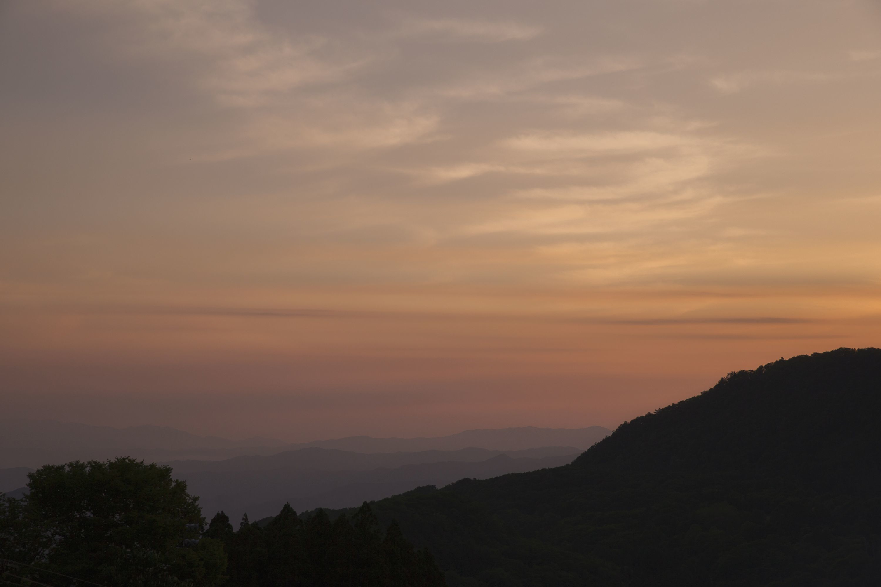 A mountainous landscape with a clear sky.