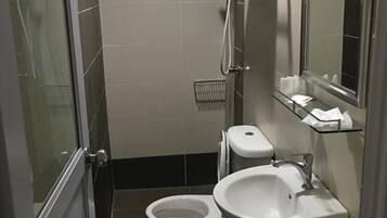 Shower, free toiletries, hair dryer, towels
