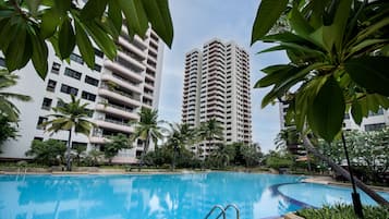 Outdoor pool, pool umbrellas, sun loungers