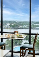 Breakfast, lunch, dinner served; international cuisine, pool views 