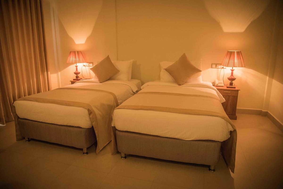 deluxe twin room, balcony | 1 bedroom, premium bedding, minibar, in-room safe