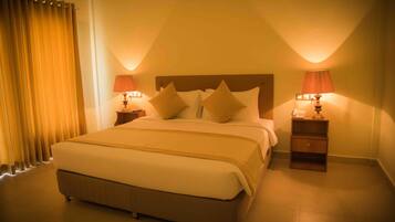 Habitación doble Deluxe | Ropa de cama de alta calidad y minibar