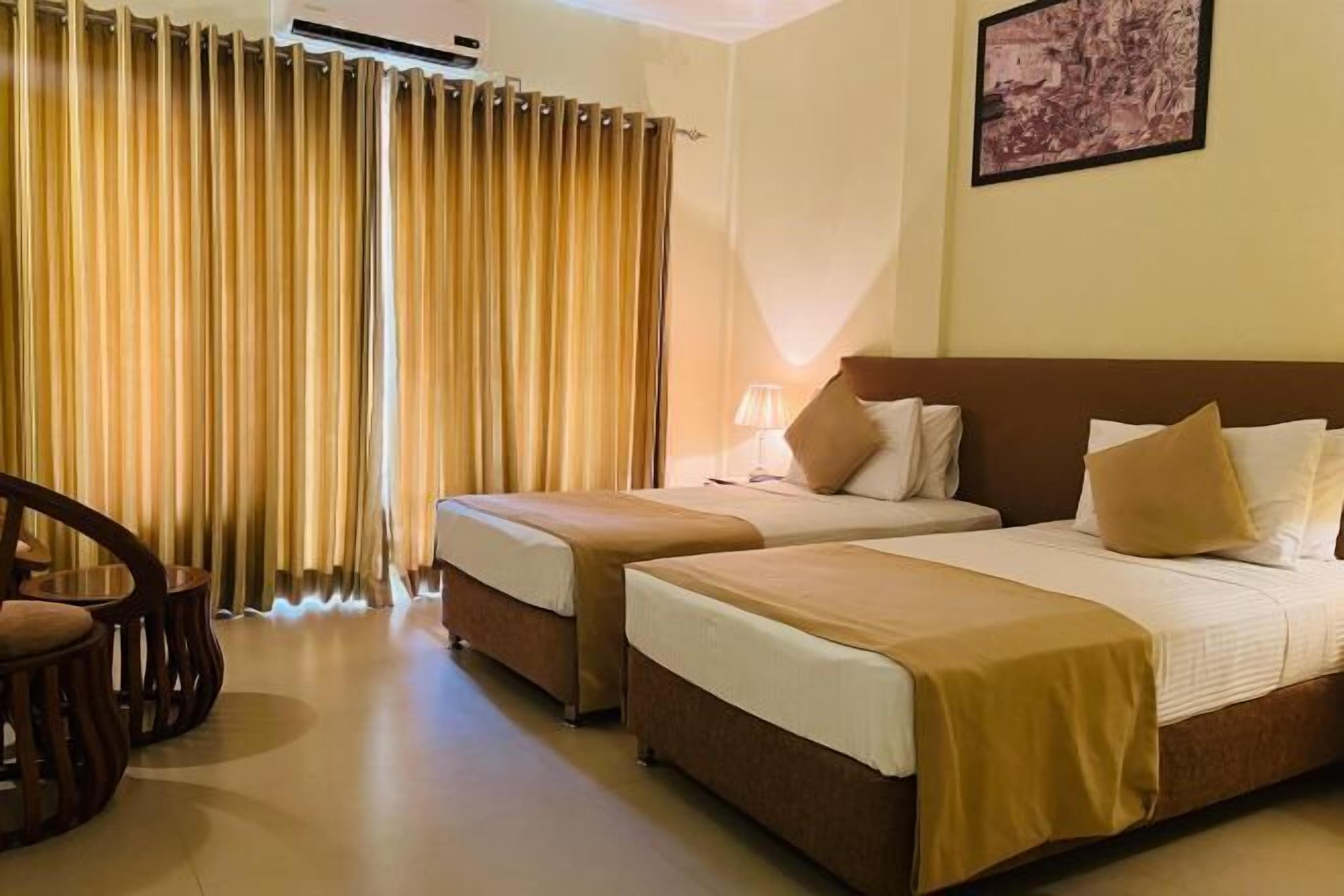 Luxe beddengoed, een minibar, een kluis op de kamer, een bureau