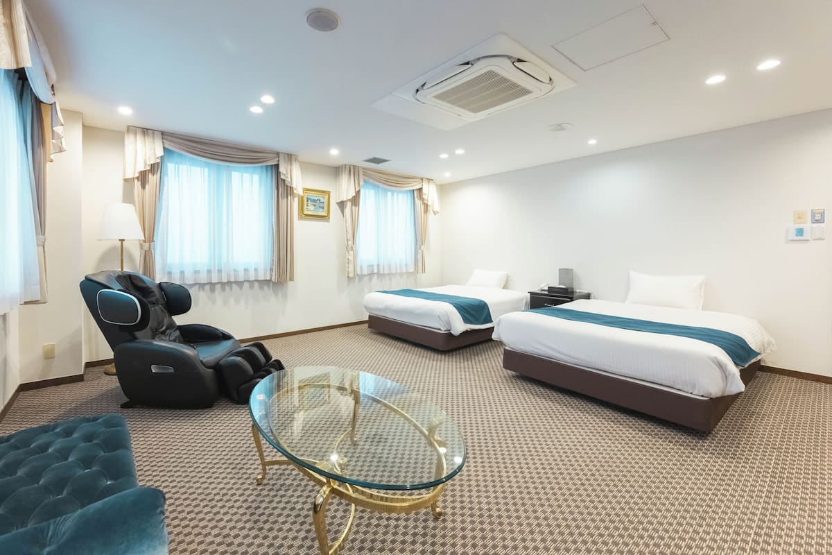 Suite, Non Smoking | Minibar, in-room safe, desk, free WiFi