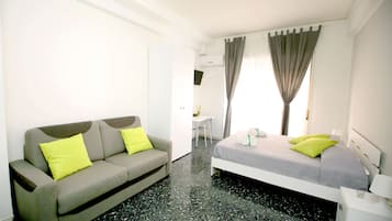 Quadruple Room, Balcony | Premium bedding, down comforters, desk, blackout drapes
