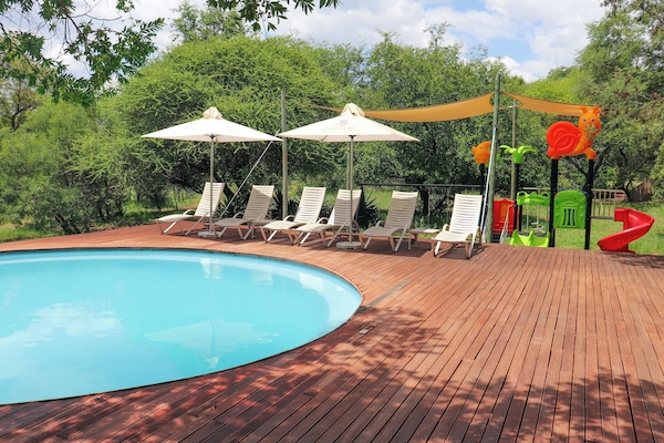 2 outdoor pools, pool umbrellas, sun loungers